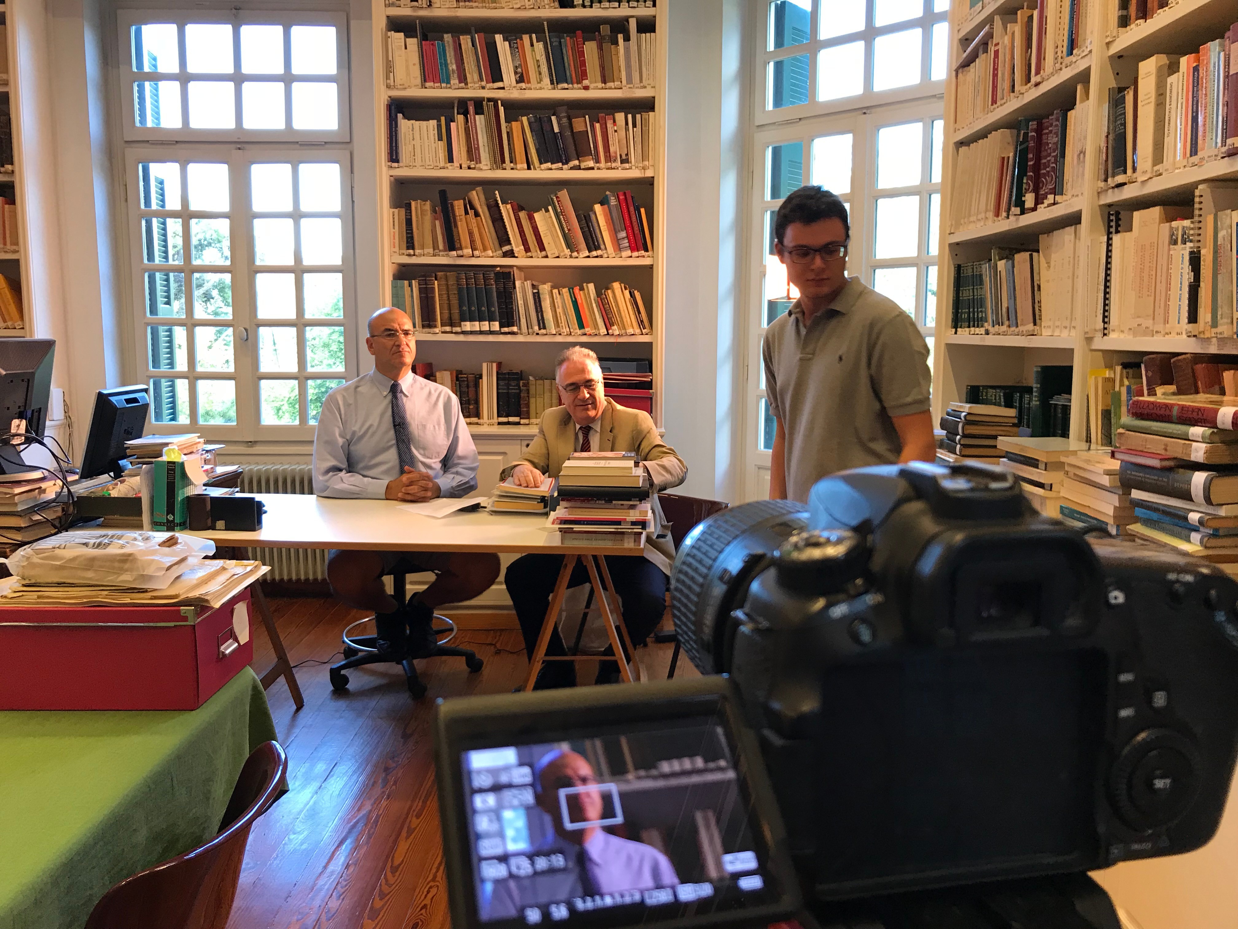 During the filming of an interview